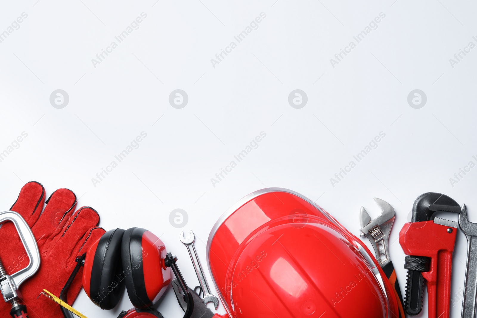 Photo of Composition with different construction tools on white background, top view