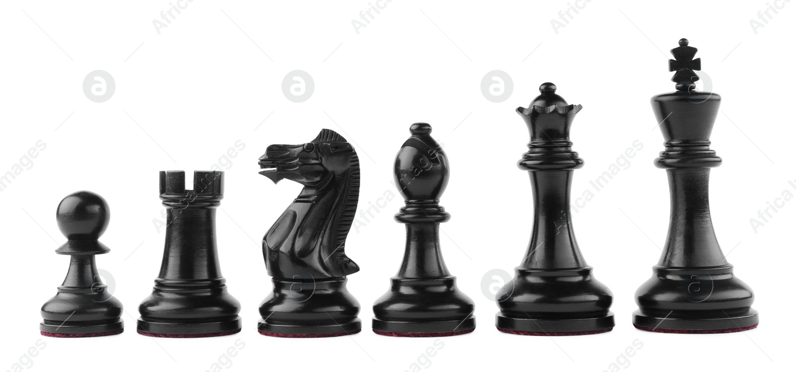 Photo of Row of black chess pieces on white background