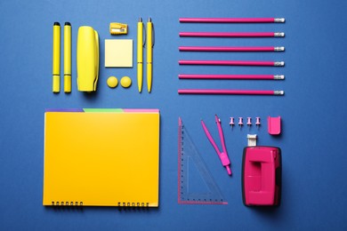 Flat lay composition with different stationery on blue background