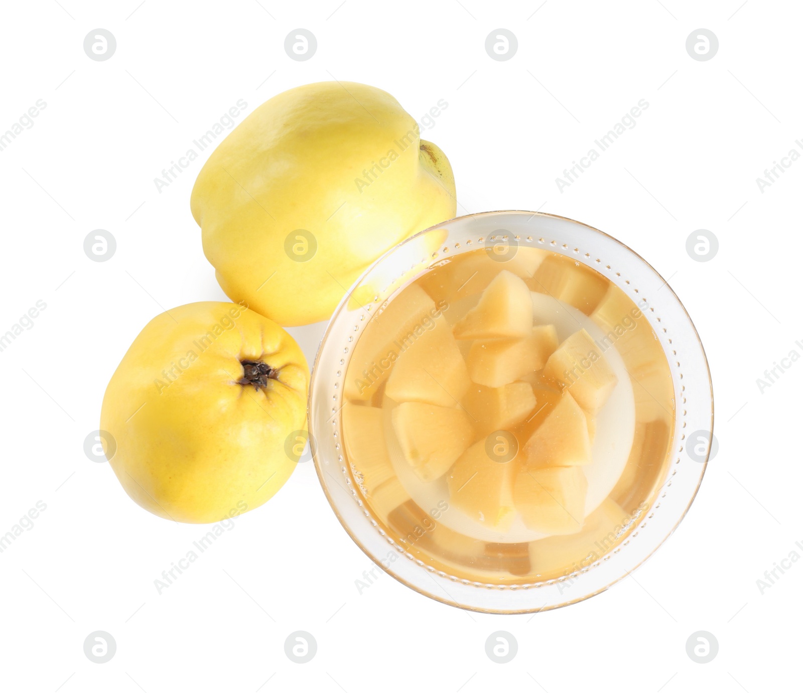 Photo of Delicious quince drink in glass bowl and fresh fruits isolated on white, top view