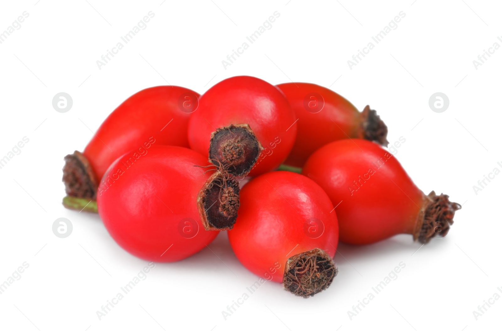 Photo of Heap of ripe rose hip berries on white background