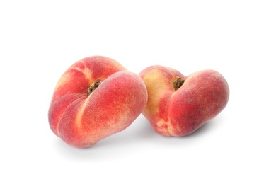 Fresh ripe donut peaches on white background