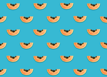Image of Pattern of papaya slices on blue background