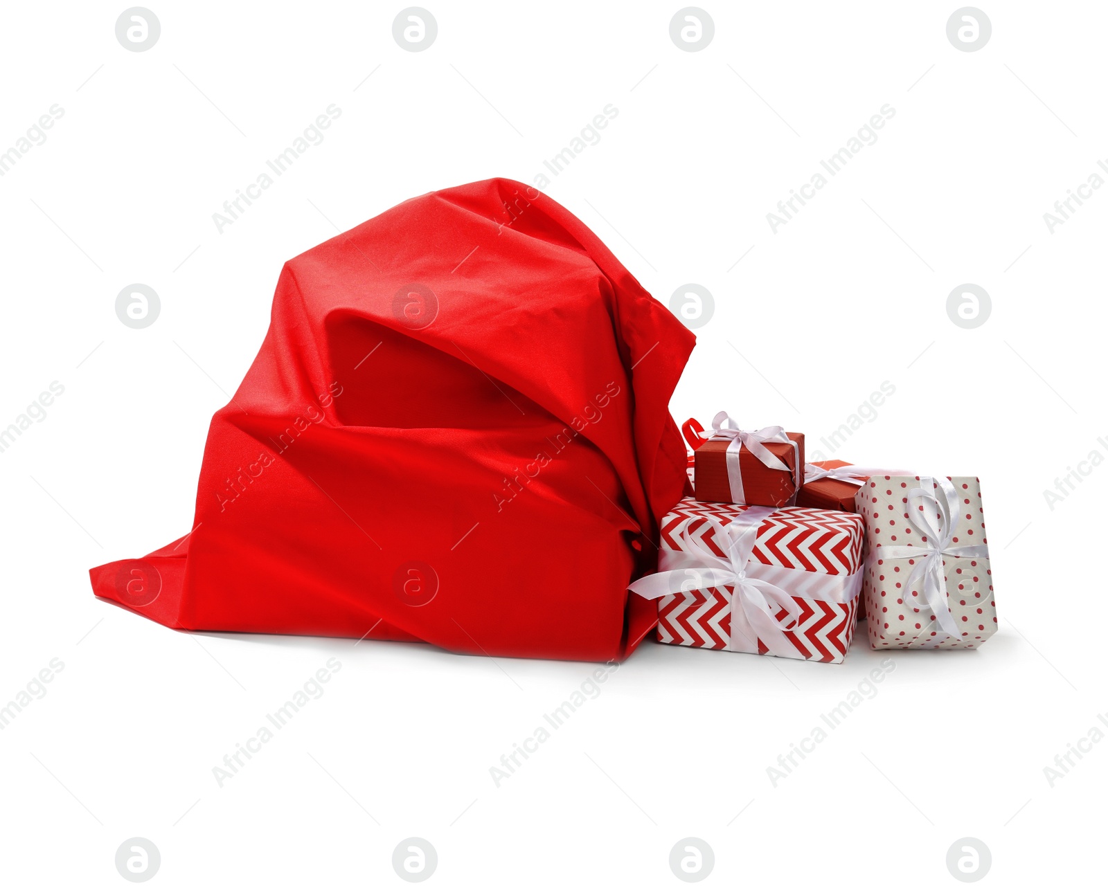 Photo of Santa Claus red bag full of presents on white background