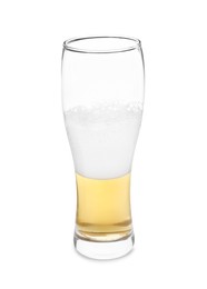 Photo of Half full glass of beer isolated on white