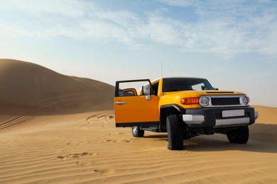 Photo of Modern car in desert ready for dune bashing