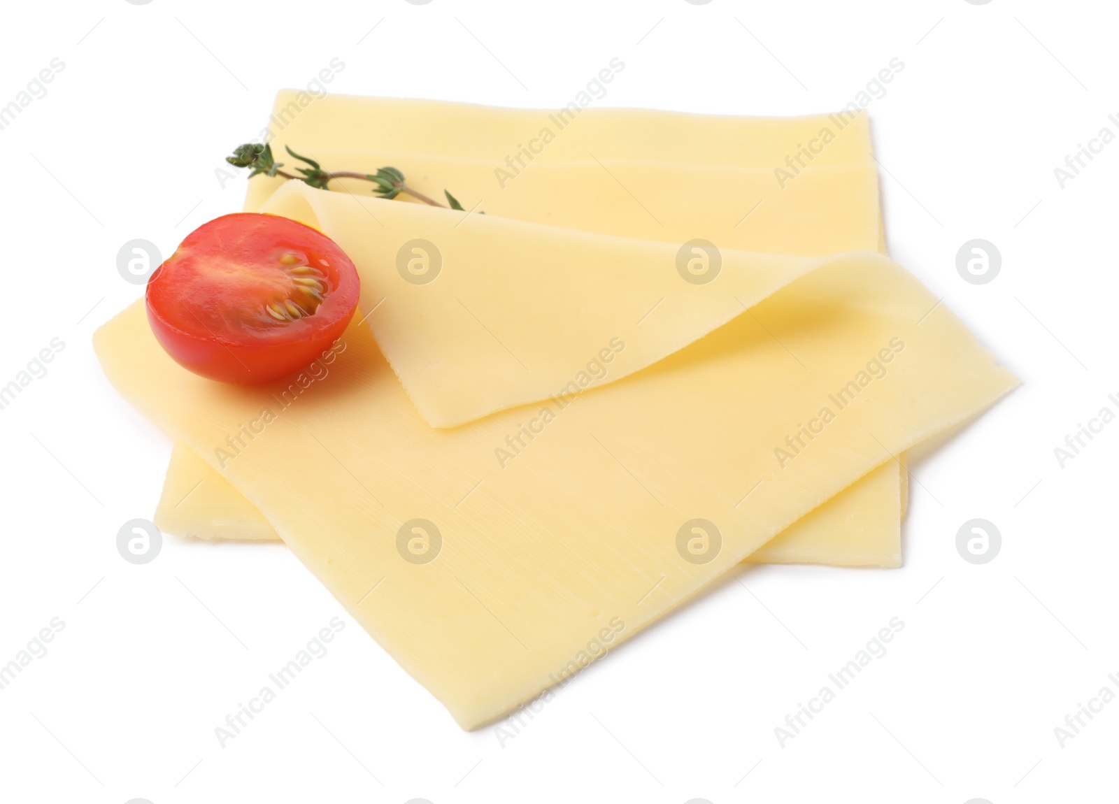 Photo of Slices of tasty fresh cheese, thyme and tomato isolated on white