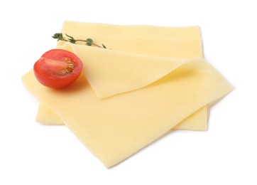 Slices of tasty fresh cheese, thyme and tomato isolated on white