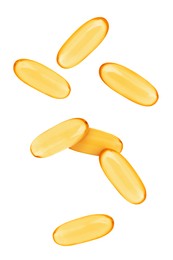 Image of Vitamin. Softgel capsules falling on white background