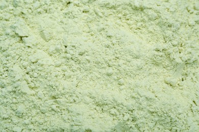 Photo of Natural celery powder as background, closeup view