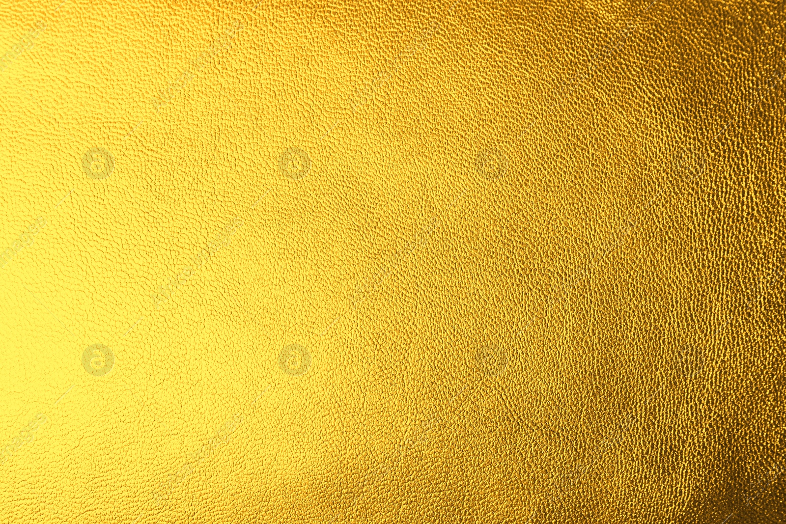 Image of Golden textured surface as background, closeup view