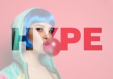 Woman in colorful wig blowing bubblegum through word Hype on pink background