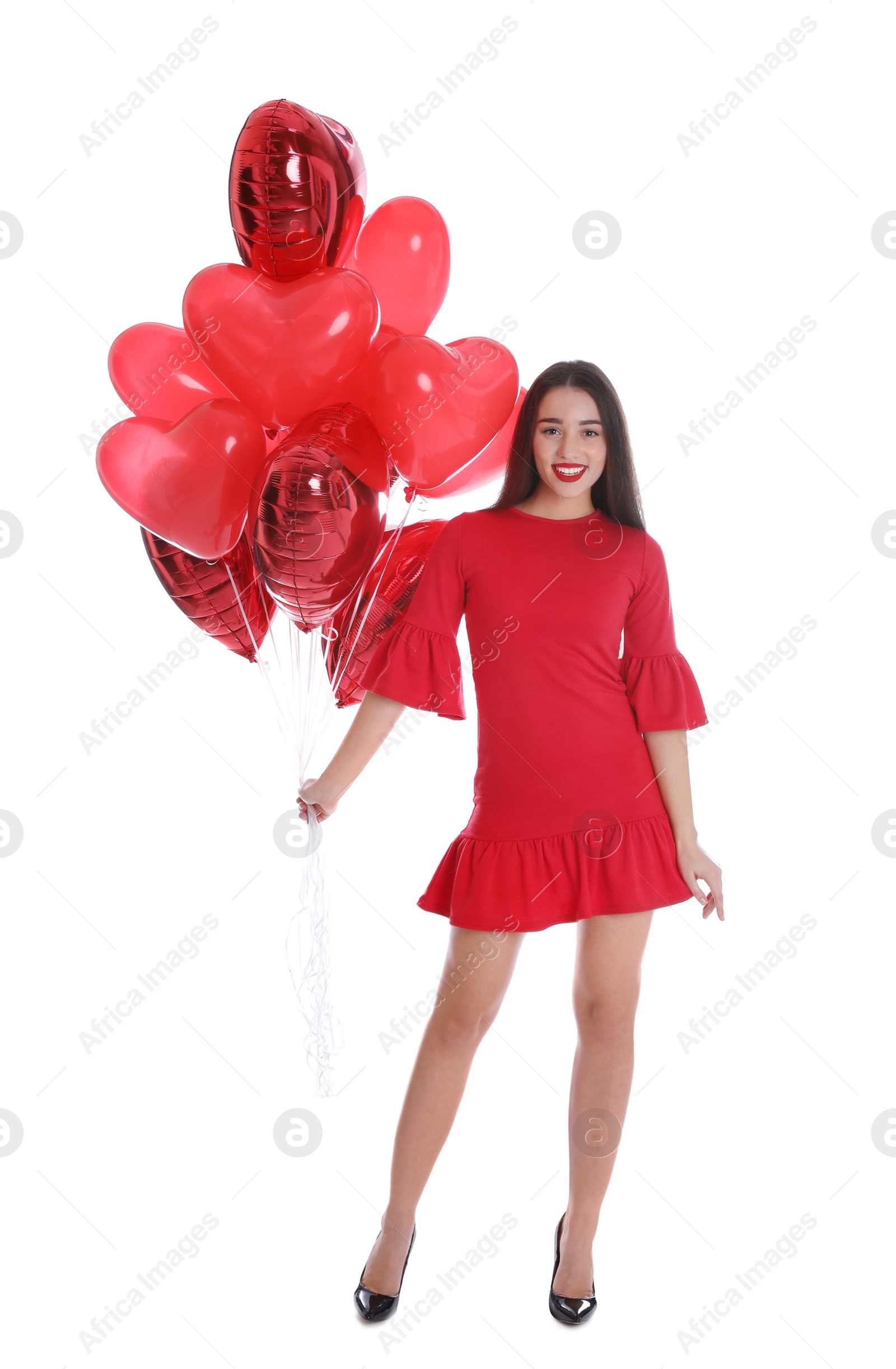 Photo of Beautiful girl with heart shaped balloons isolated on white. Valentine's day celebration