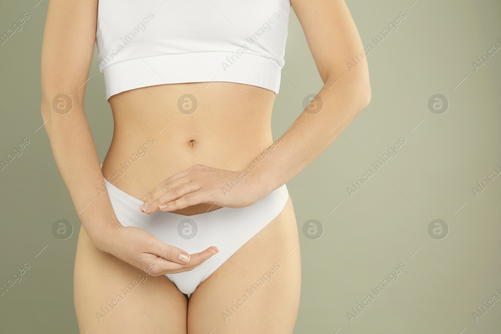 Photo of Gynecology. Woman in underwear on grey background, closeup. Space for text