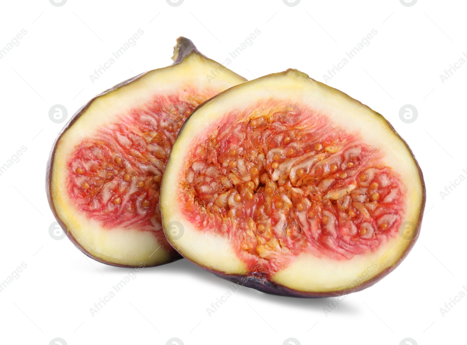 Photo of Pieces of fresh ripe fig isolated on white