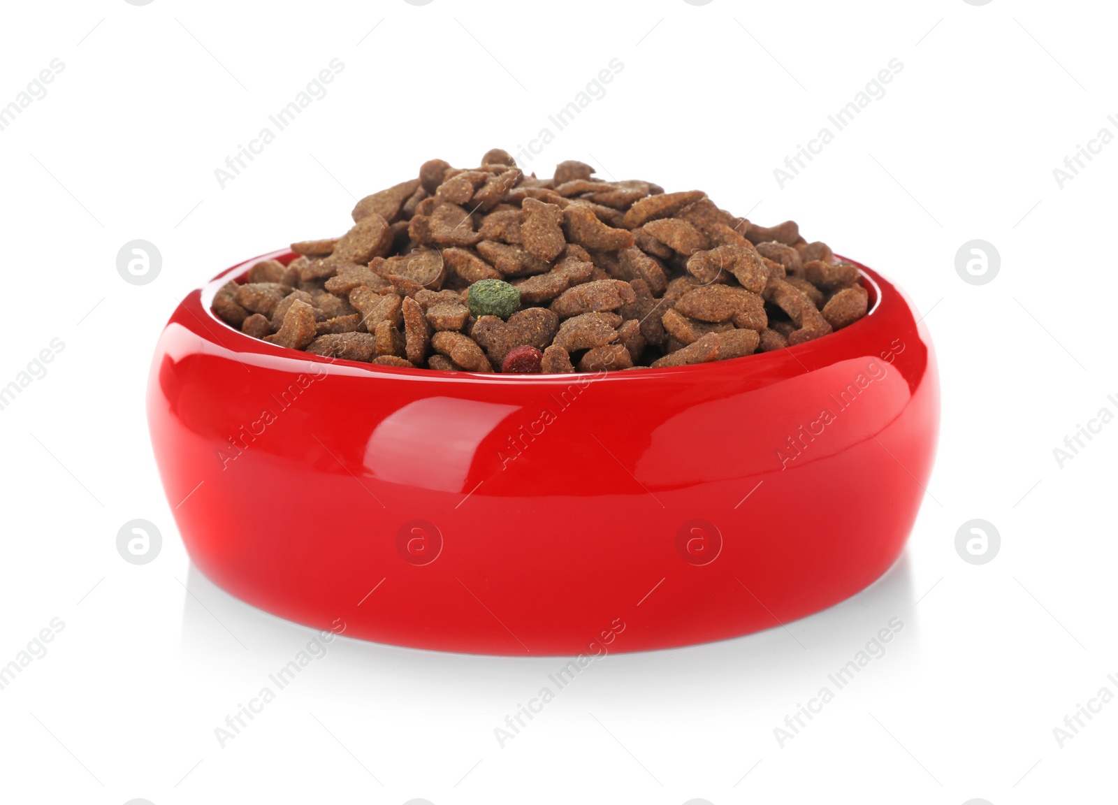 Photo of Bowl with food for cat or dog on white background. Pet care