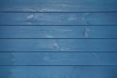 Photo of Texture of blue wooden surface as background, top view