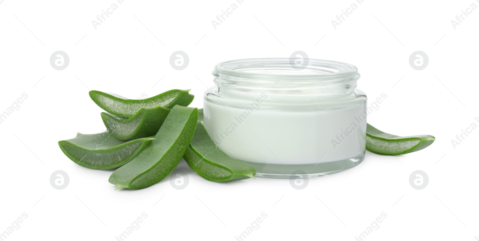 Photo of Jar of natural cream and cut aloe leaves isolated on white