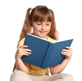 Photo of Portrait of cute little girl reading book on white background