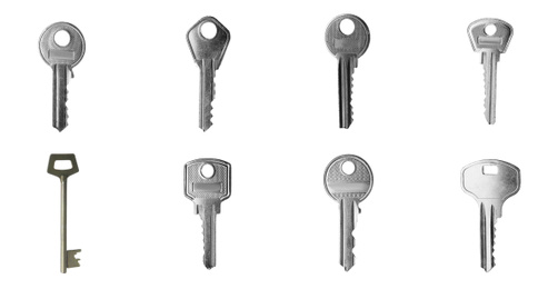 Image of Set of modern steel keys on white background. Banner design