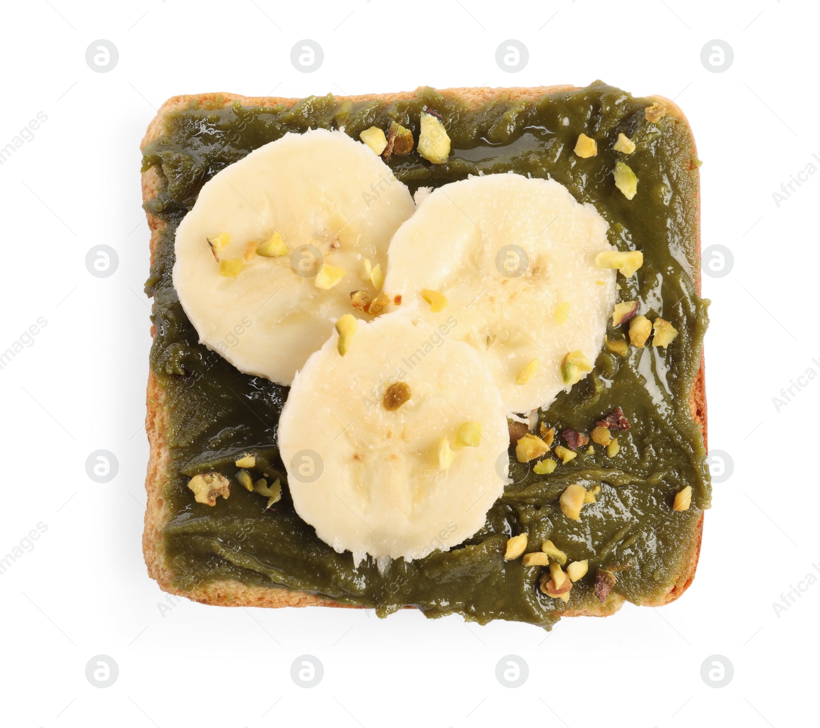 Photo of Toast with tasty pistachio butter, banana slices and nuts isolated on white, top view