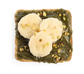 Toast with tasty pistachio butter, banana slices and nuts isolated on white, top view