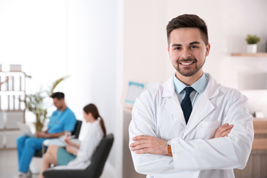 Photo of Portrait of male doctor in modern clinic