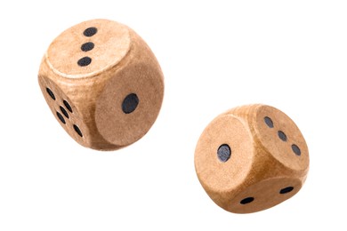 Two wooden dice in air on white background