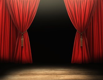 Image of Empty wooden stage and open red curtains