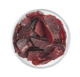 Photo of Bowl of delicious beef jerky isolated on white, top view