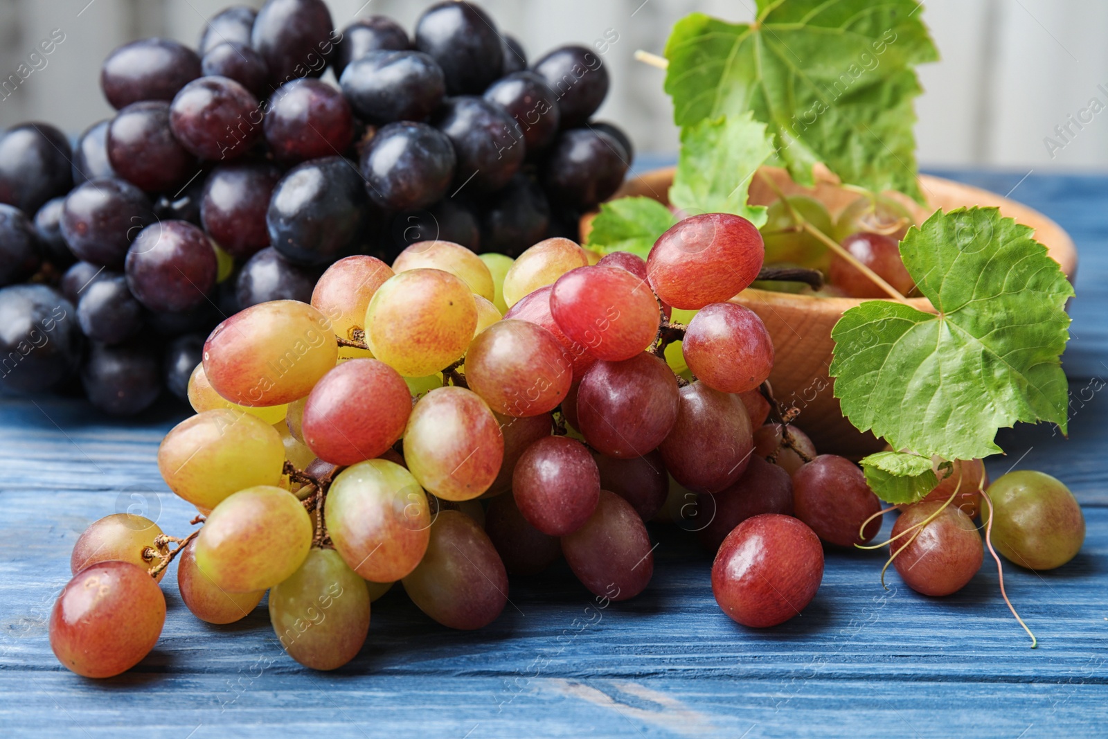 Photo of Fresh ripe juicy grapes on table, closeup