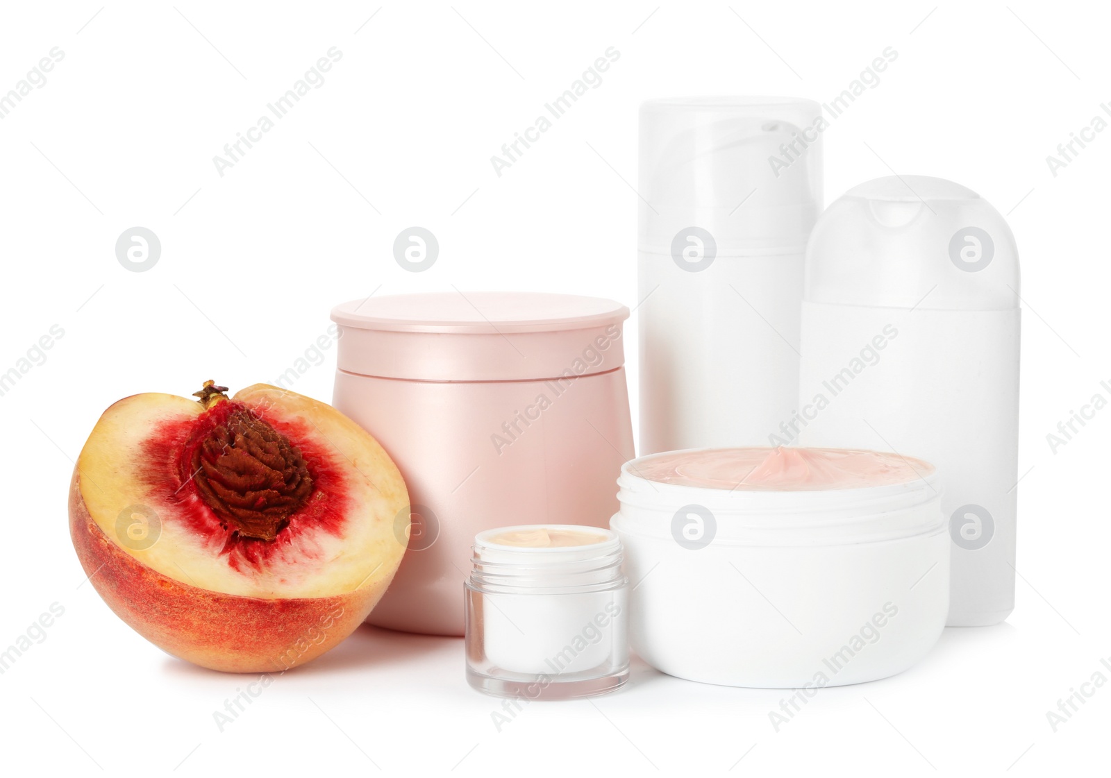 Photo of Jars with cream and bottles on white background. Hand care cosmetics