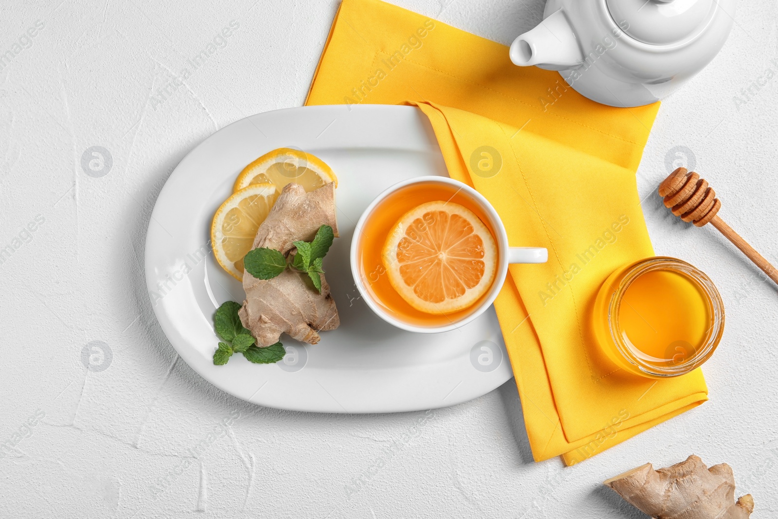 Photo of Flat lay composition with tea and therapeutic products on white background