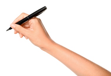 Photo of Young woman holding pen on white background, closeup