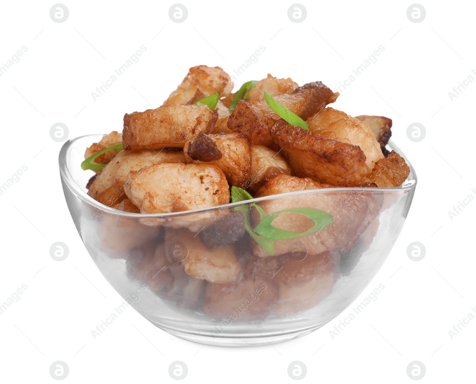 Photo of Tasty fried cracklings with green onion in bowl on white background. Cooked pork lard