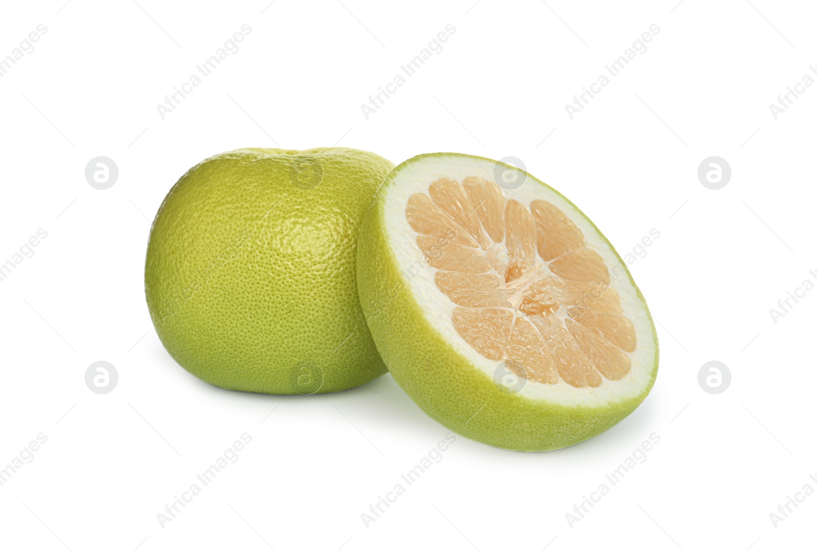 Photo of Whole and cut sweetie fruits on white background