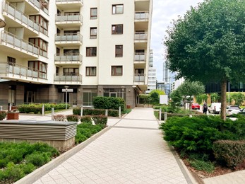 Photo of City street with beautiful building and pavement