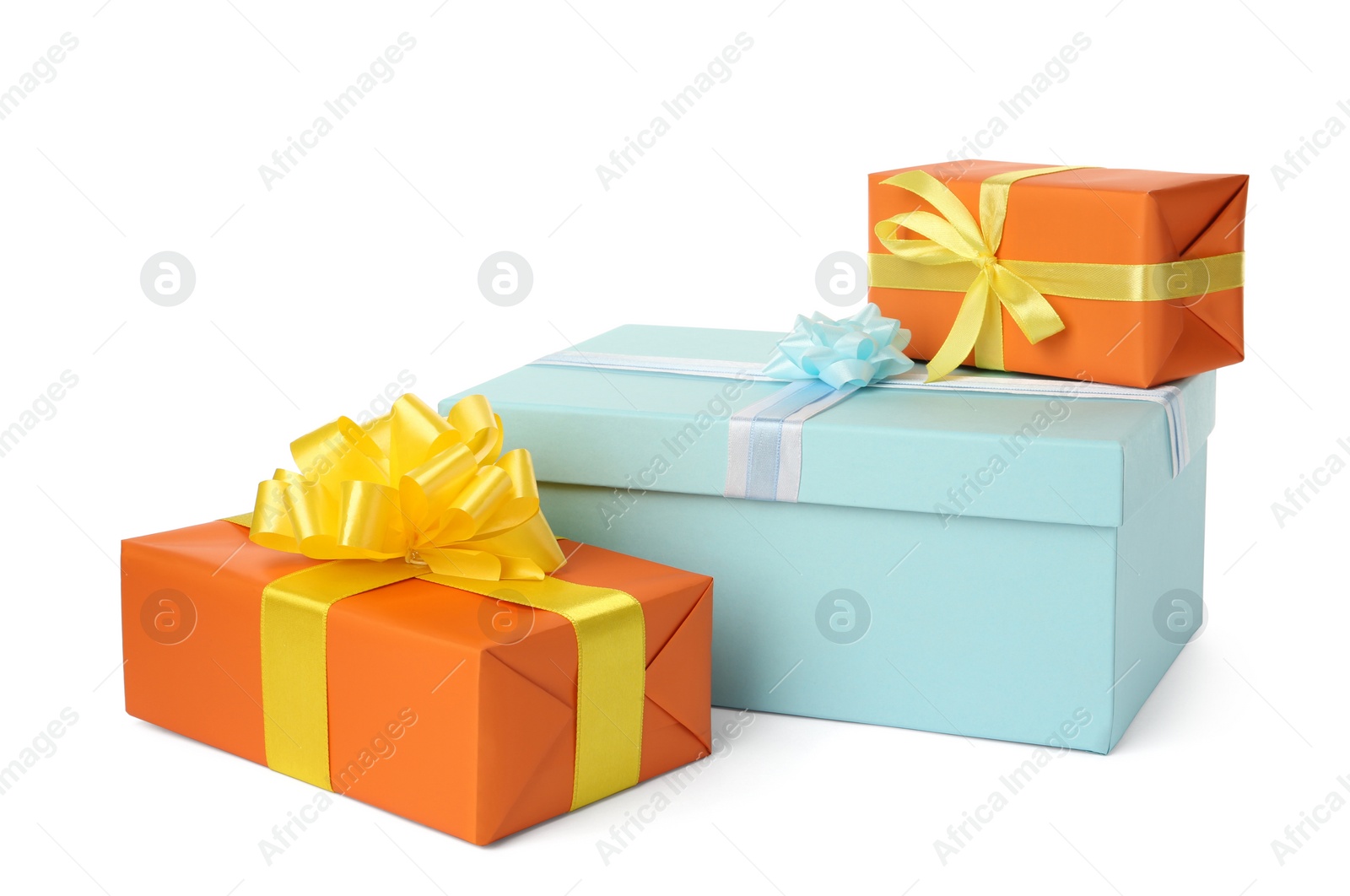 Photo of Colorful gift boxes with bows on white background