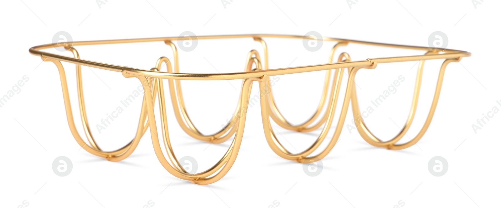 Photo of Golden metal egg tray on white background