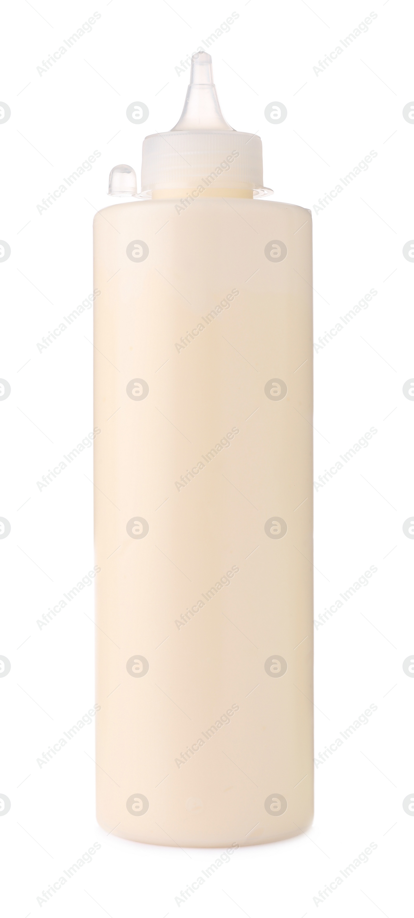 Photo of Plastic bottle of tasty mayonnaise isolated on white