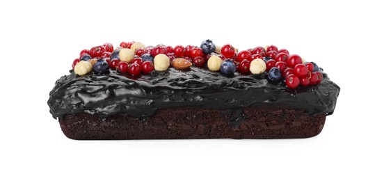 Photo of Delicious chocolate sponge cake with berries and nuts isolated on white