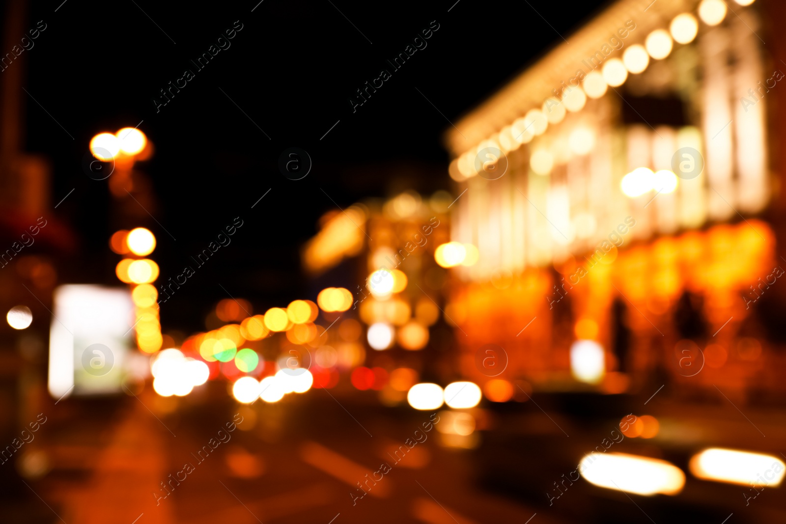 Photo of Blurred view of beautiful city at night. Bokeh effect