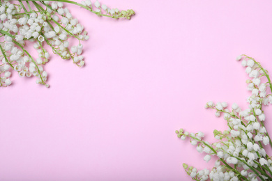 Photo of Beautiful lily of the valley flowers on pink background, flat lay. Space for text