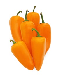 Photo of Fresh raw orange hot chili peppers on white background, top view