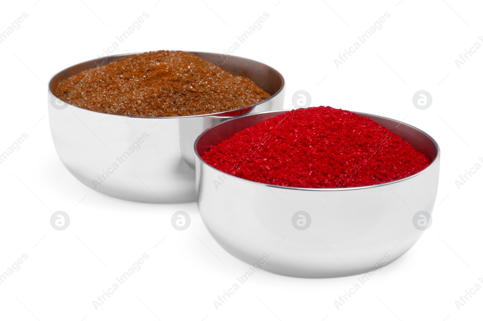 Photo of Bowls with food coloring on white background