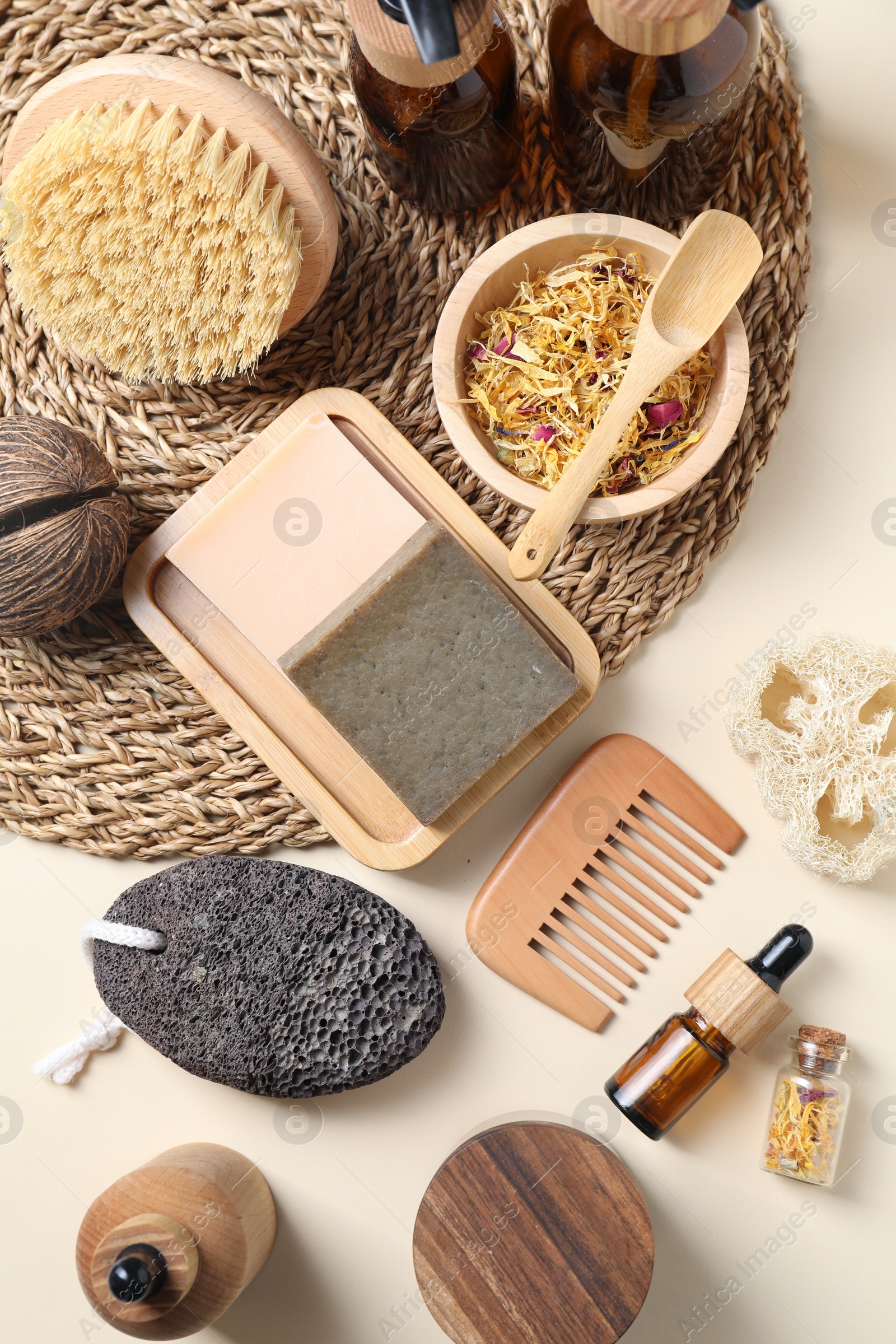 Photo of Bath accessories. Flat lay composition with personal care products on beige background