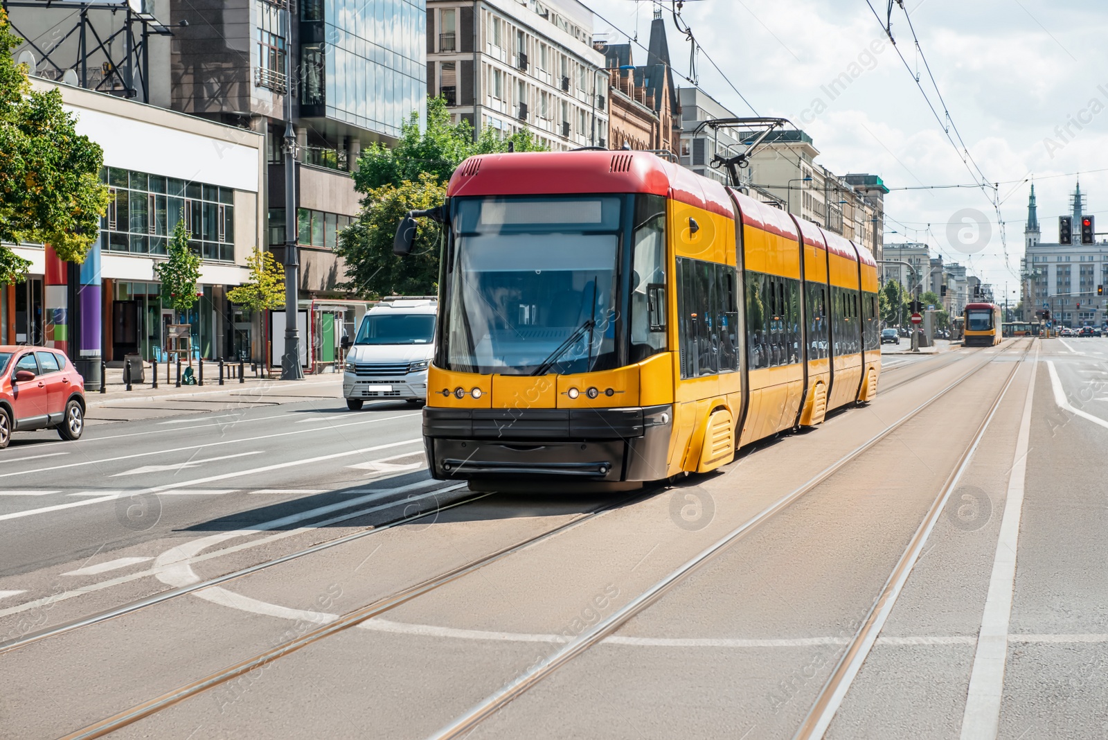 Photo of Streetcar on road in city. Public transport