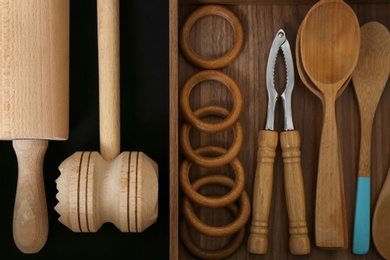 Drawer with utensil set, top view. Order in kitchen