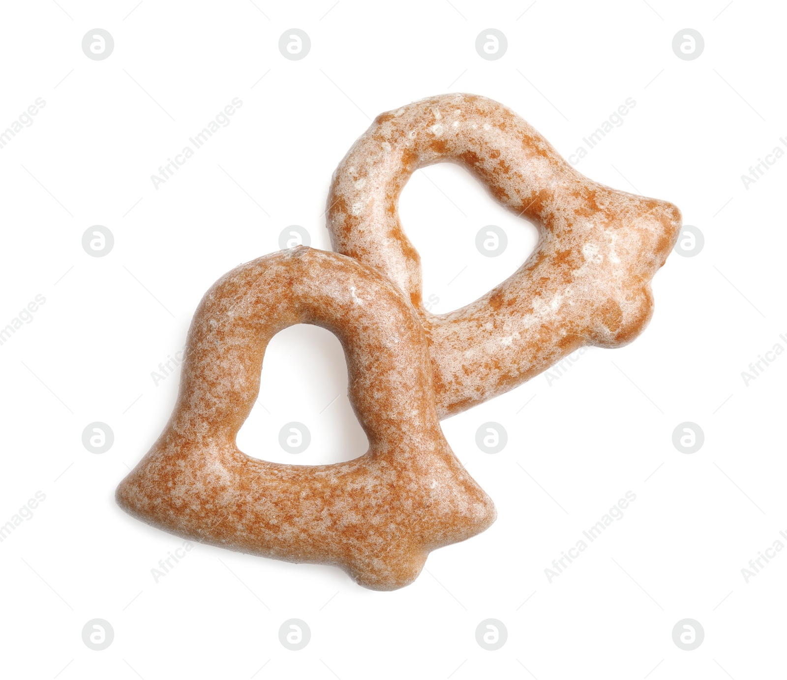 Photo of Delicious homemade bell shaped cookies isolated on white, top view