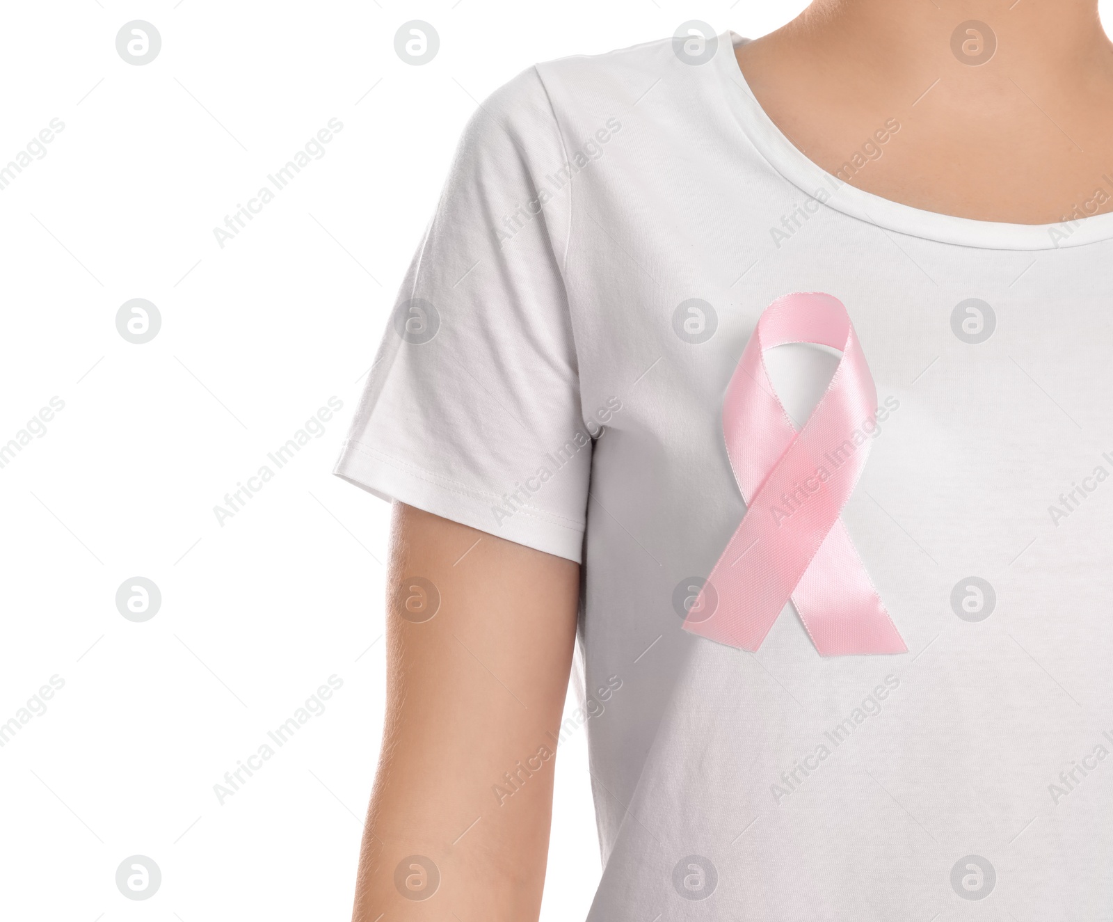 Photo of Woman with pink ribbon on white background, closeup. Breast cancer awareness